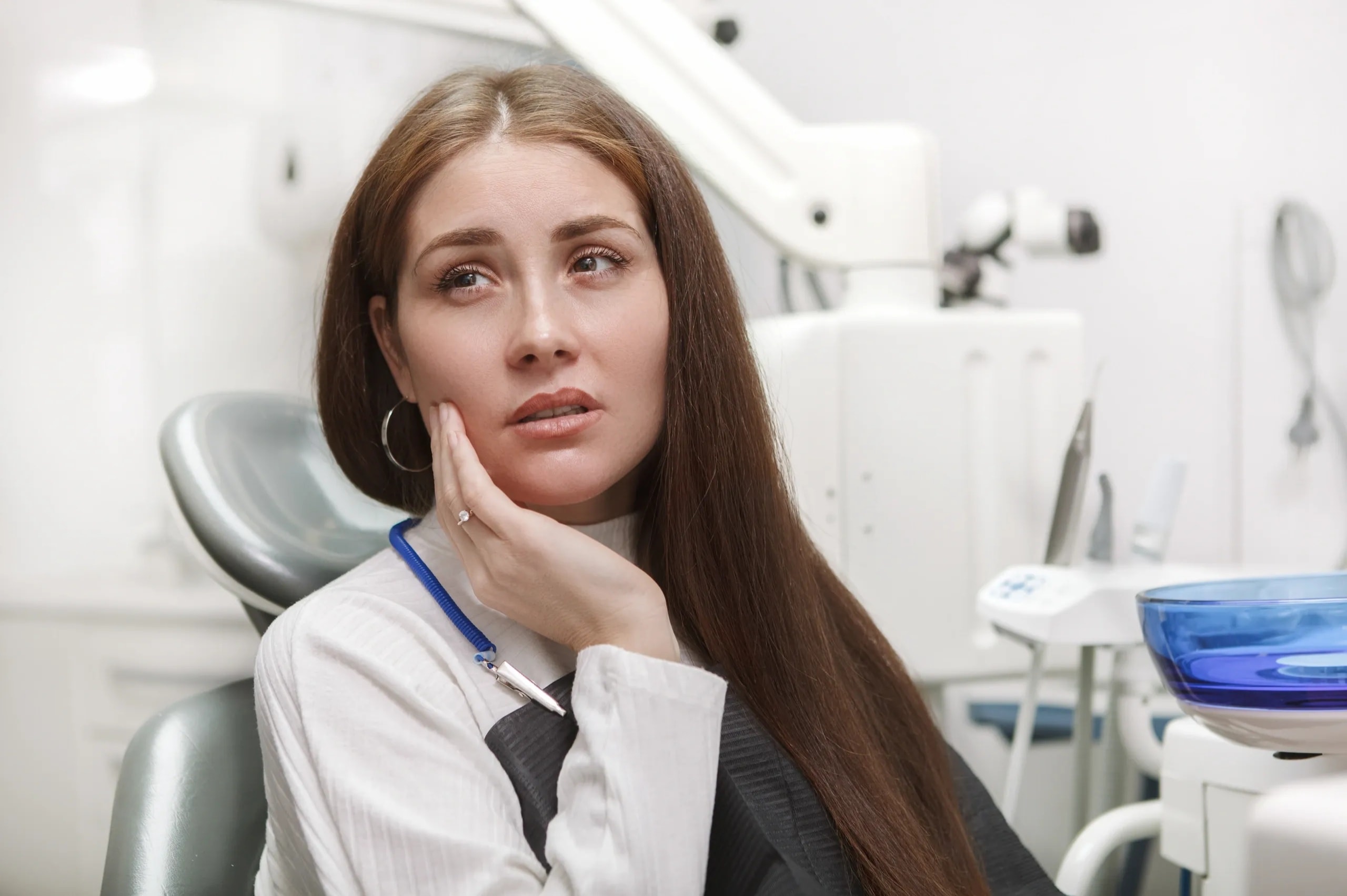 Dentist treating emergency dental patient